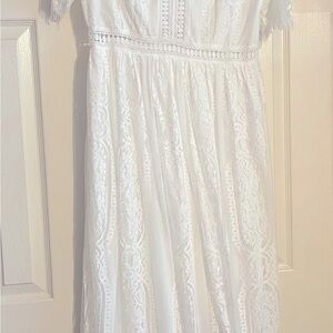 Long white dress , could be used as a wedding dress.